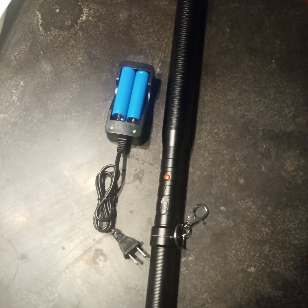 Tactical baton flashlight with batteries and charger